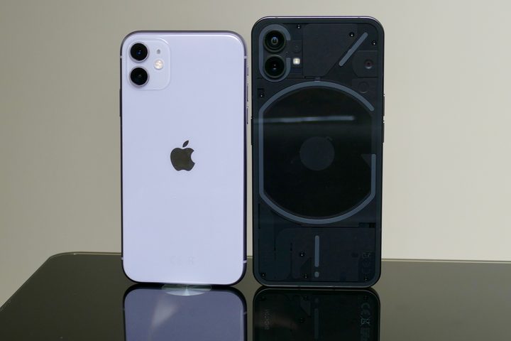 The back of the iPhone 11 and Nothing Phone 1.