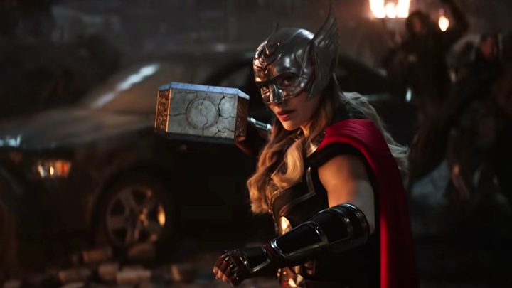 Natalie Portman's Jane Foster wields mjolnir in Thor: Love and Thunder.