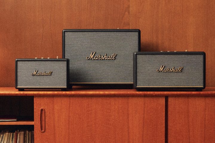 Marshall home family of speakers in black sit on a table.