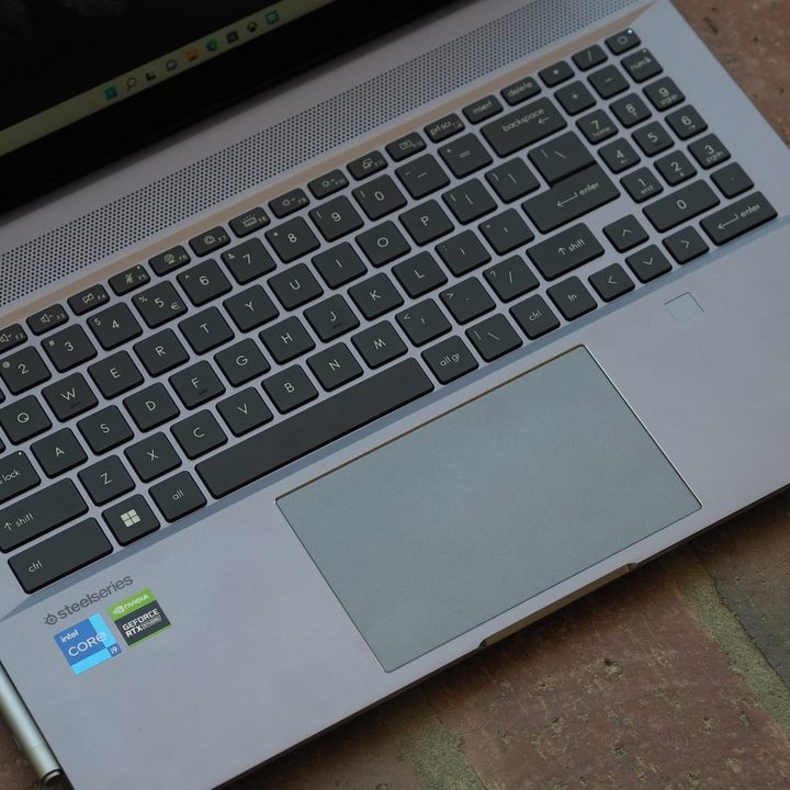 MSI Creator Z16P top down view showing keyboard, touchpad, and pen.