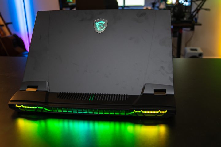 RGB lighting pouring out the back of the MSI GT77 Titan laptop.