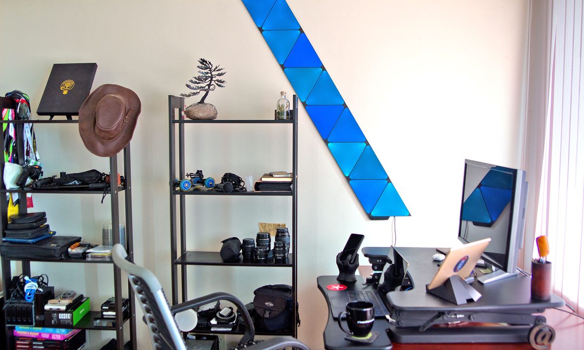 Nanoleaf Shapes light tiles installed next to a desk.