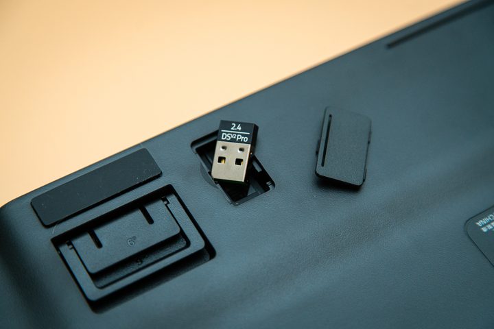 Wireless dongle sitting inside Razer DeathStalker keyboard.
