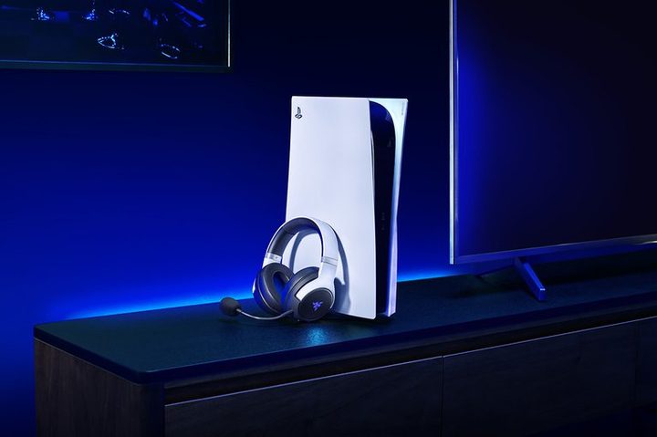 The Razer Kaira Pro sitting next to a PS5 console.