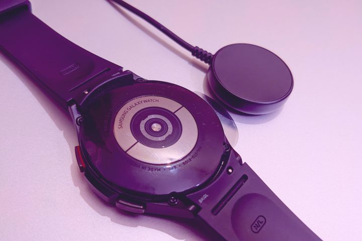 Galaxy Watch 4 with the supplied charging puck