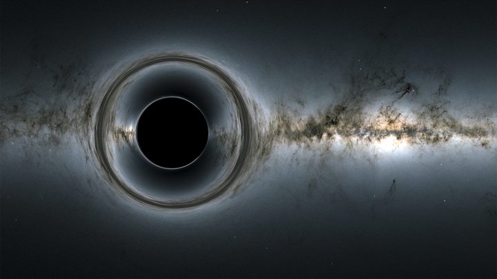 This simulation of a supermassive black hole shows how it distorts the starry background and captures light, producing a black hole silhouettes.