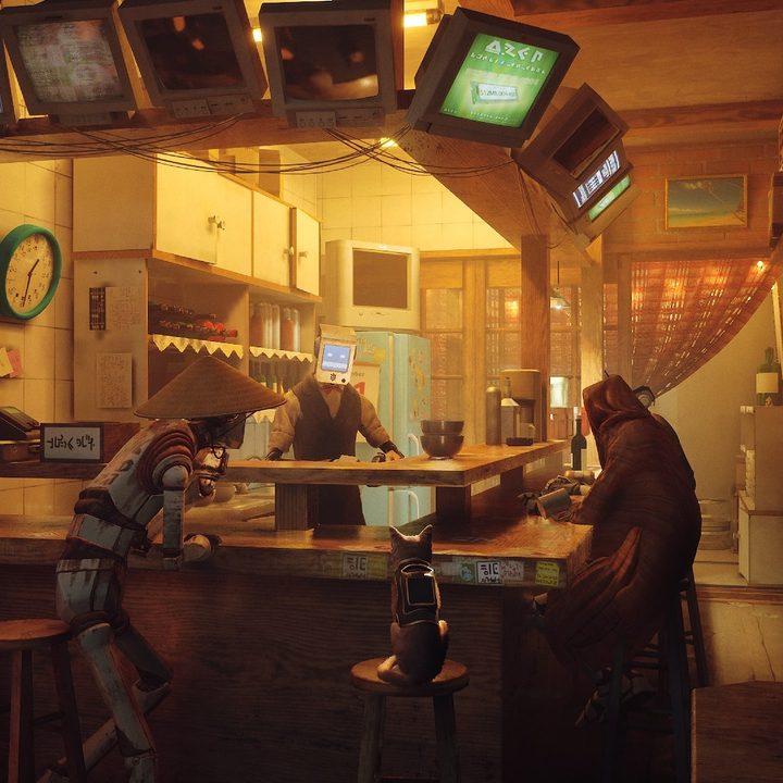 A cat sits at a bar with androids in Stray.