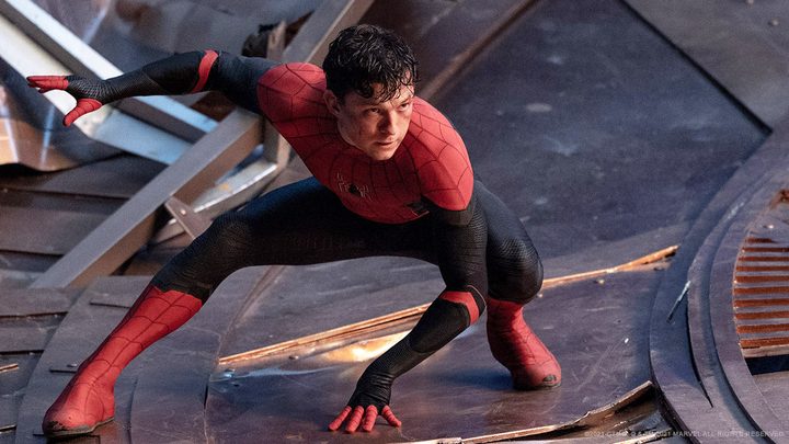 Tom Holland's Spider-man poses unmasked, preparing to fight the Green Goblin.