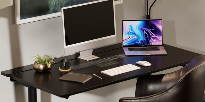 The Lumina desk with a few computing devices on it.