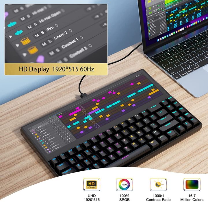 A Ficihp K2 keyboard on a wooden desk with a digital sound mixer on its display