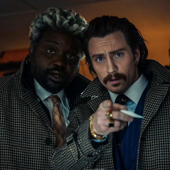 Aaron Taylor-Johnson and Brian Tyree Henry are surprised.