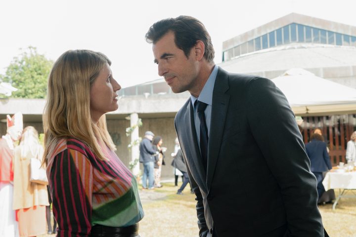 Claes Bang leans in toward Sharon Horgan in Apple TV+'s Bad Sisters.