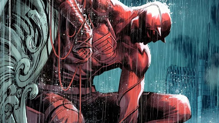 Daredevil brooding on a building as the rain pours.