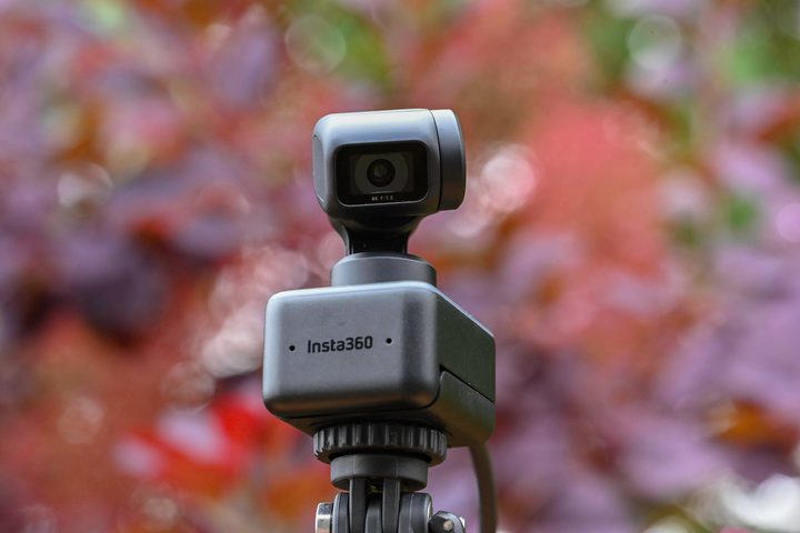 The Insta360 Link looking down with an out of focus background.