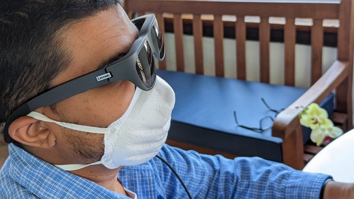 The Lenovo Smart Glasses T1 on a head