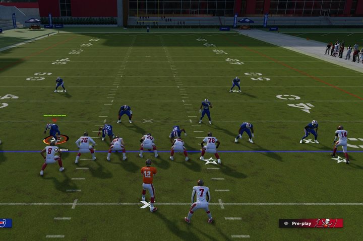 The defense presses a receiver in Cover 2 Man in Madden 23.