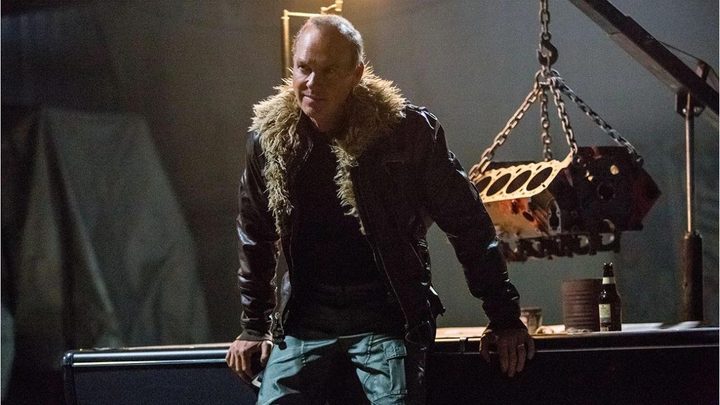 Adrian Toomes leaning against a table in Spider-Man: Homecoming.