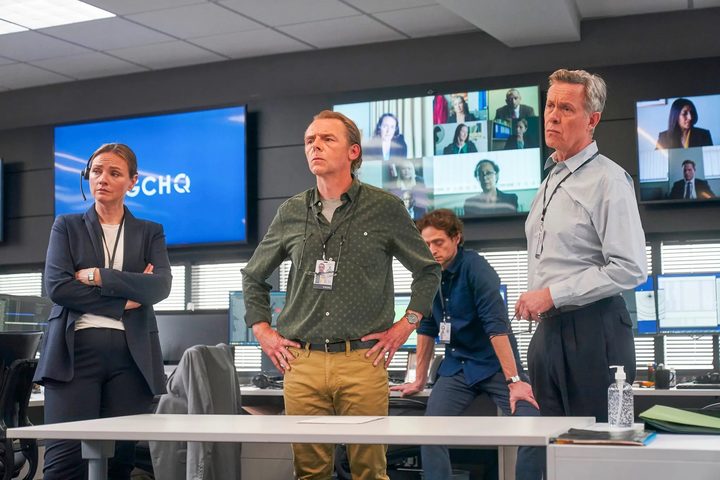 Simon Pegg and Alex Jennings stand in an office together in The Undeclared War.