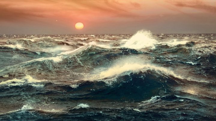 Artistic representation of the surface of TOI-1452 b, which could be an “ocean planet”, i.e. a planet entirely covered by a thick layer of liquid water.