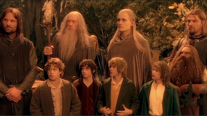 The Fellowship of the Ring in a hazy ocher.
