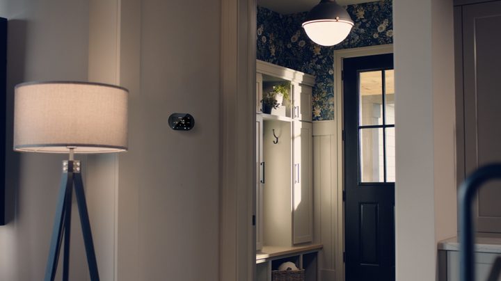 Cync Smart Thermostat installed in a living room.