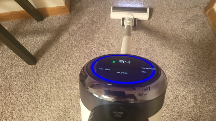 Tineco vacuum in use with the iLoop display turned on.