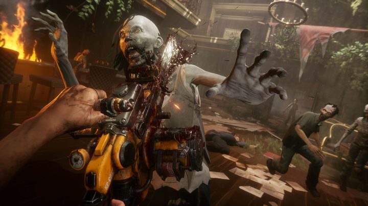 The player chainsaws a zombie in The Walking Dead: Saints and Sinners Chapter 2: Retribution.
