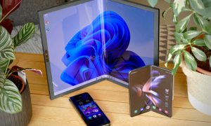 The Asus Zenbook Fold 17 with the Galaxy Z Fold 4 and Galaxy Fold.