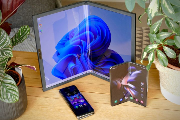 The Asus Zenbook Fold 17 with the Galaxy Z Fold 4 and Galaxy Fold.