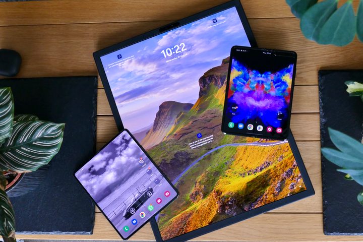 The Asus Zenbook Fold 17 with the Galaxy Z Fold 4 and Galaxy Fold.