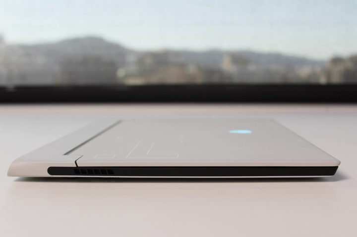 The side of the Alienware x14 on a table.