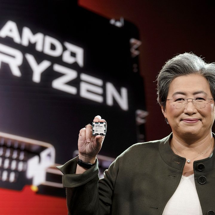 AMD CEO holding a Ryzen 7000 processor.