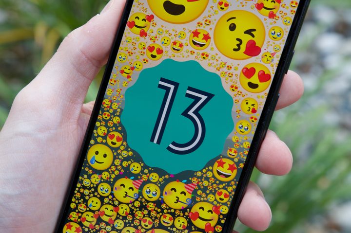 Android 13 logo on a Google Pixel 6a.