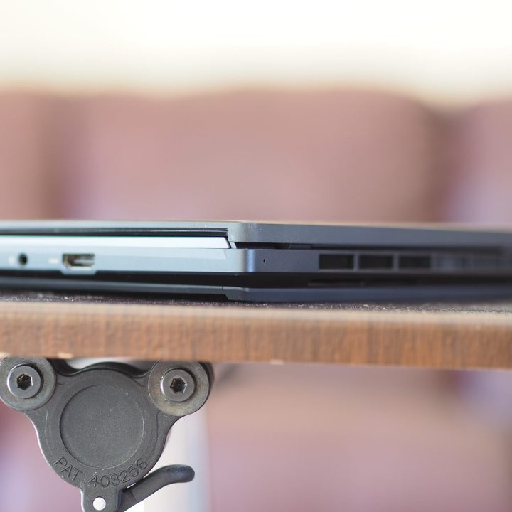 Asus ZenBook Pro 16X rear side view showing ports and vents.