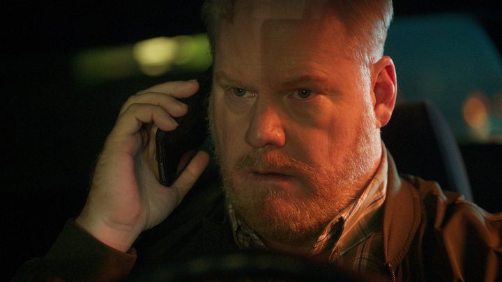 A man talks on his cell phone in Collide.