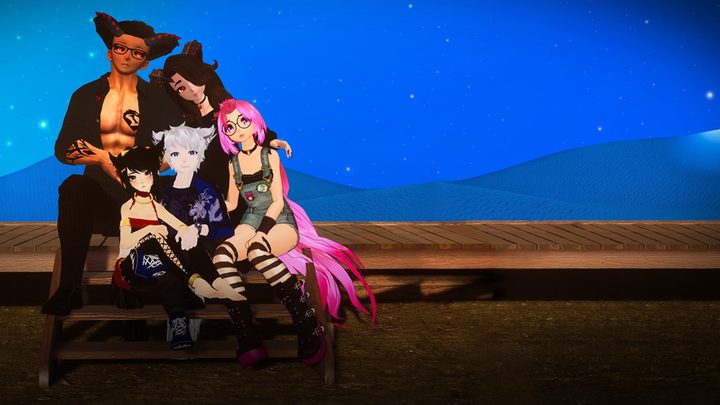 Four VR characters sit together in We Met in Virtual Reality.