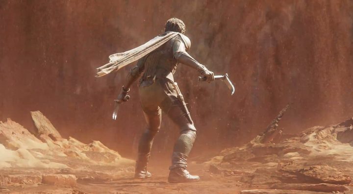 Character from Dune Awakening looking at a sandstorm.