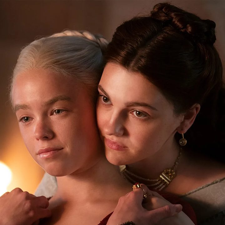 Two girls in an embrace in a scene from House of the Dragon on HBO Max.