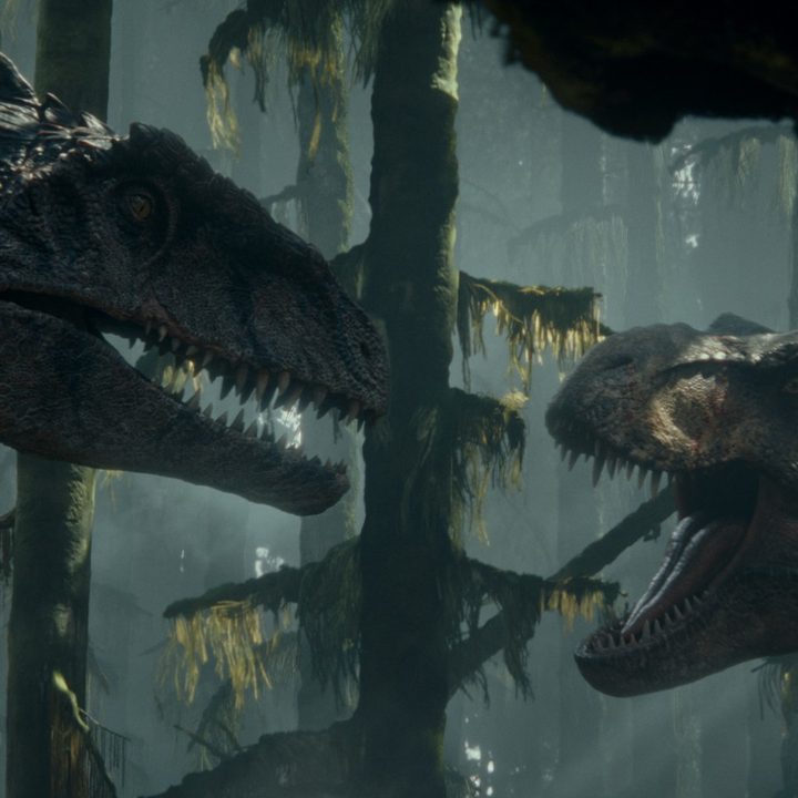 A Giganotosaurus faces off against a Tyrannosaurus Rex in a scene from Jurassic World Dominion.