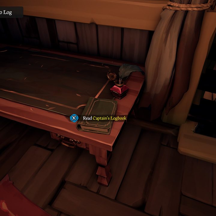 A Logbook sits on the corner of a desk aboard a sloop in Sea of Thieves.