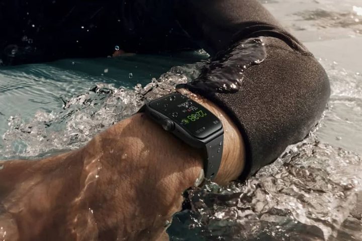 Man wearing Oppo Watch 3 Pro in water.