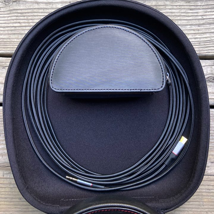 Mark Levinson No. 5909 headphones' carry case, open, showing cable.