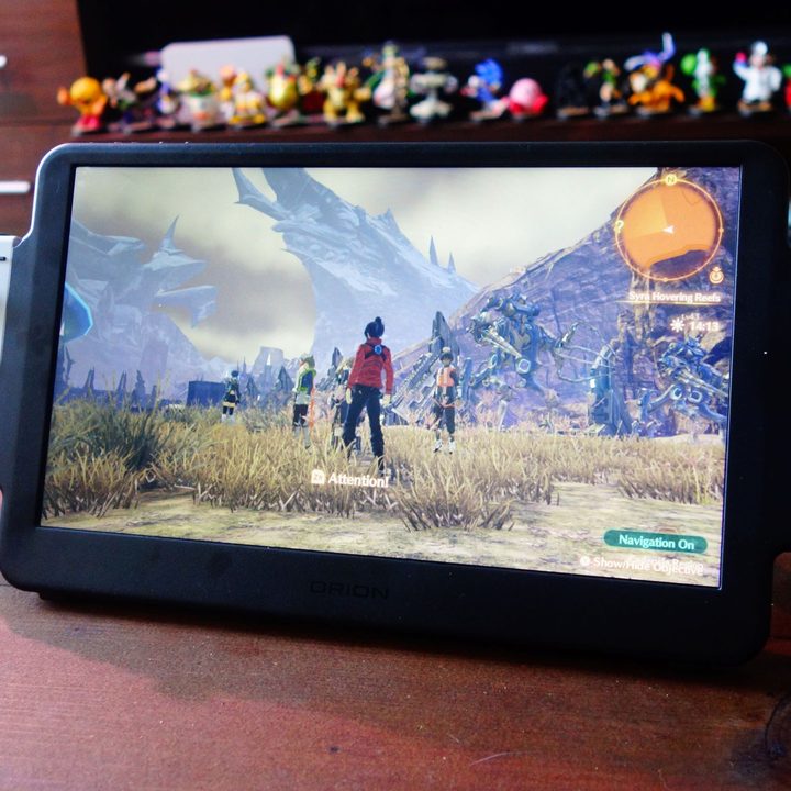 A Switch in an Orion monitor displays Xenoblade Chronicles 3.