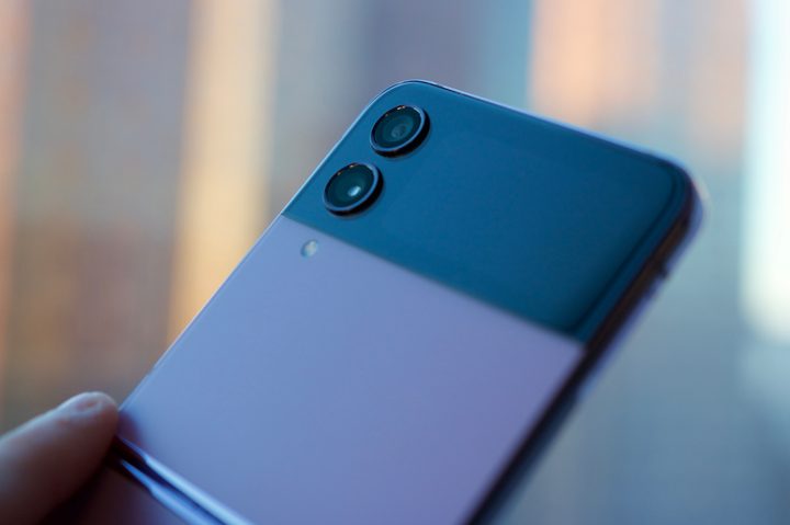 The back of the Galaxy Z Flip 4, showing its cameras and cover screen.