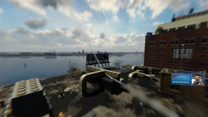 Spider-Man zipping to a rooftop.