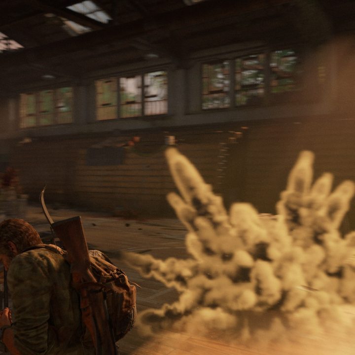 Joel dodges a bloater attack in The Last of Us Part I.
