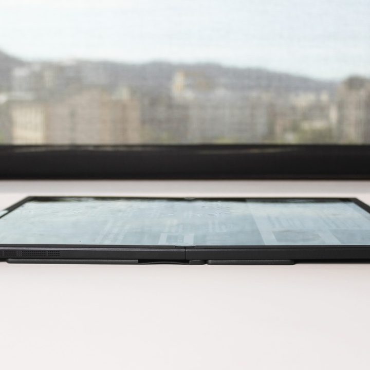 The Zenbook Fold 17 laid flat on a table.