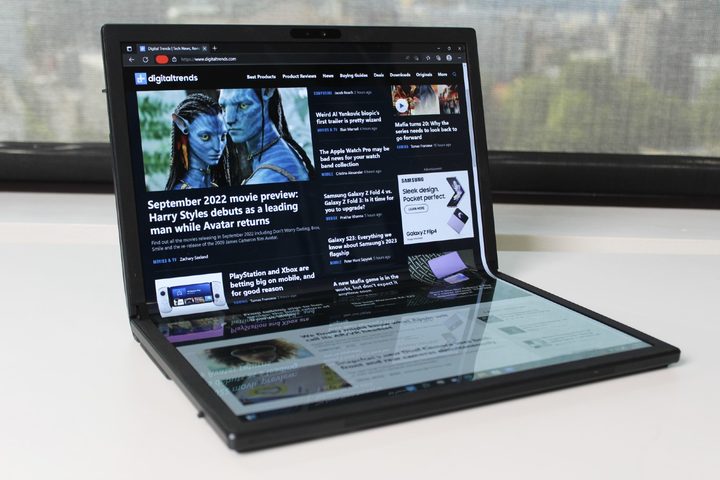 The Zenbook Fold 17 open on a table.