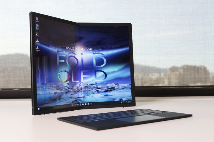The foldable Zenbook Fold 17 on a desk with its detachable keyboard.