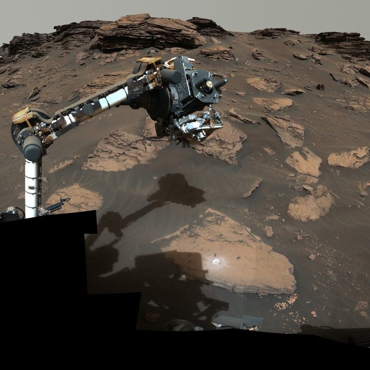 NASA’s Perseverance rover puts its robotic arm to work around a rocky outcrop called “Skinner Ridge” in Mars’ Jezero Crater.